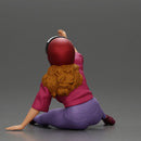 Biker Girl in a helmet who fell off a motorbike, being helped by a man - Only-Games