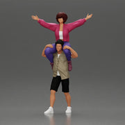 Man in shorts carrying girlfriend on shoulders girl being carried on the man's shoulders - Only-Games