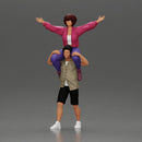 Man in shorts carrying girlfriend on shoulders girl being carried on the man's shoulders - Only-Games