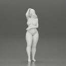 Naked girl posing putting her hand on her hair - Only-Games