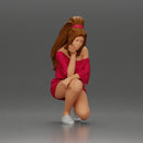 fashionable girl in beachwear is sitting and looking - Only-Games