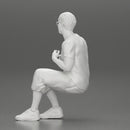 man in shorts sitting on a bench with her girlfriend in the park - Only-Games