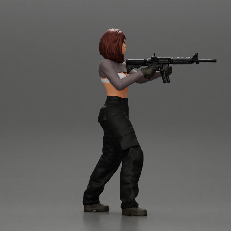 Armed girl going to shoot a gun in a bra with short hair