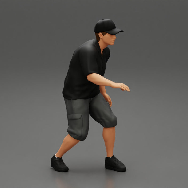 Man bent over while walking in cap - Only-Games