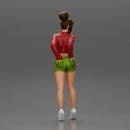 Sexy girl in shorts and an open mini shirt putting her hands in her back pocket - Only-Games