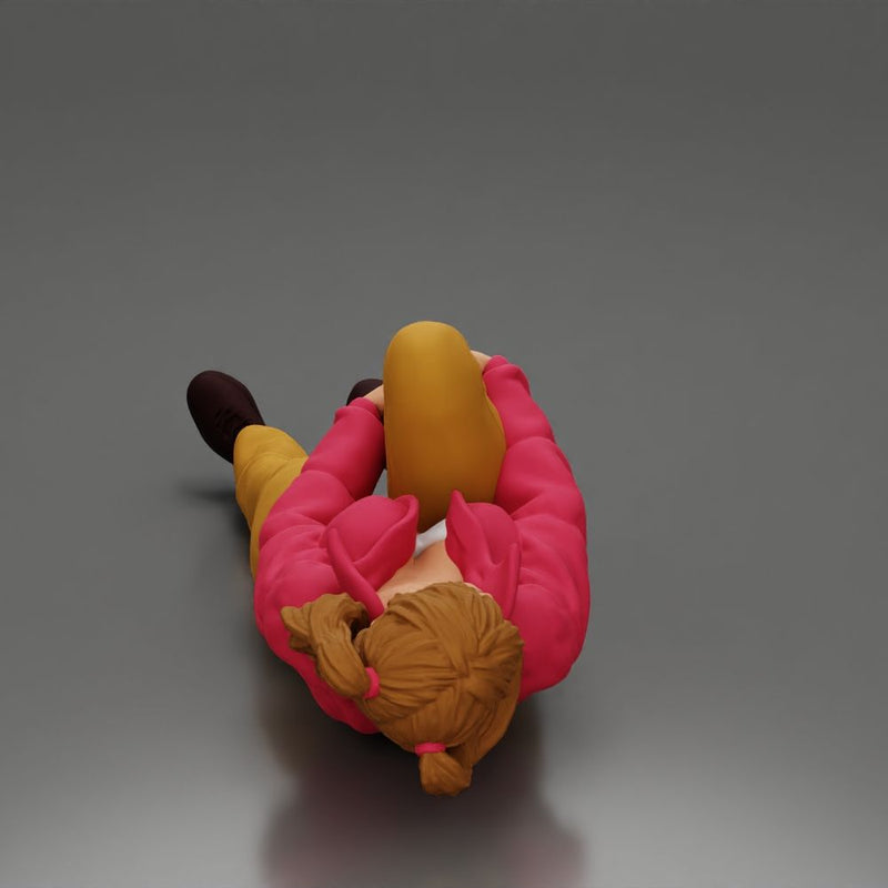 woman in mini jacket  lying on the floor touching her injured knee - Only-Games