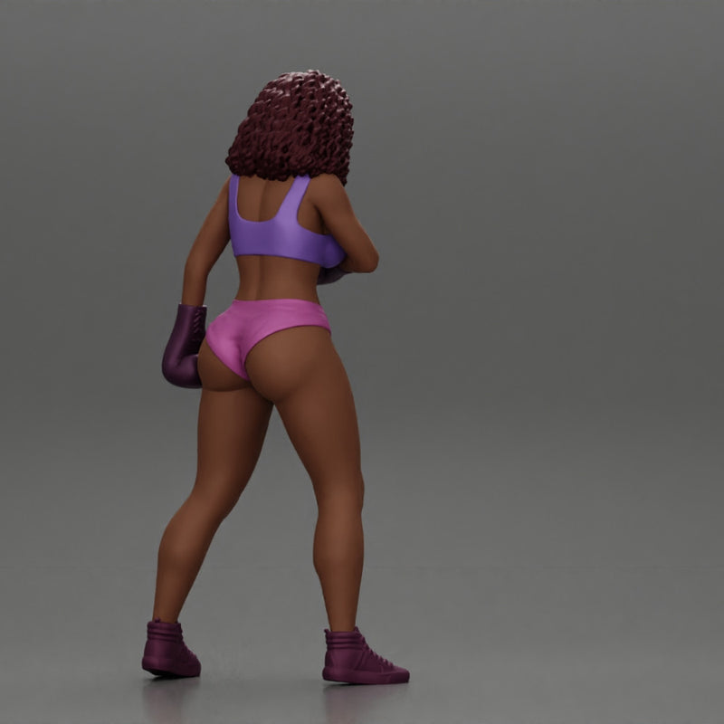 Black girl with curly hair boxing winning and screaming at the losing girl