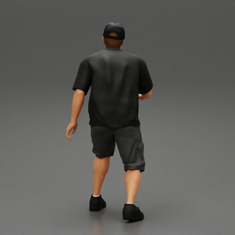 Man bent over while walking in cap - Only-Games
