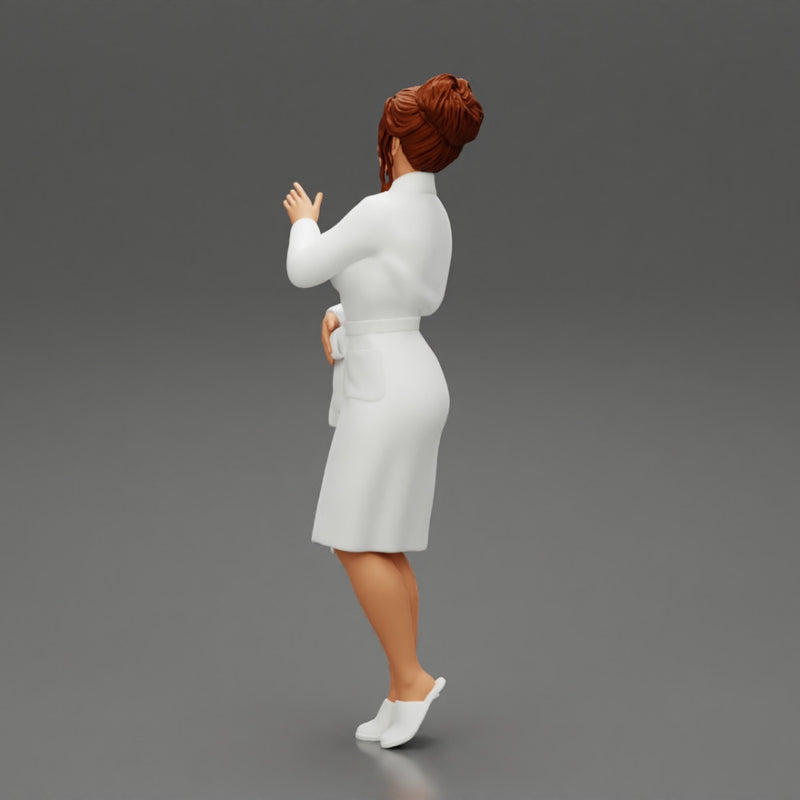 woman in a white bathrobe standing - Only-Games