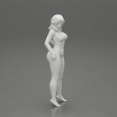 sexy girl in bikini posing standing on the beach - Only-Games