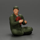 Jamie Farr sitting while eating breakfast in the MASH series - Only-Games