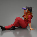 Tired woman mechanic in suit and cap sitting and drinking water during from bottle - Only-Games