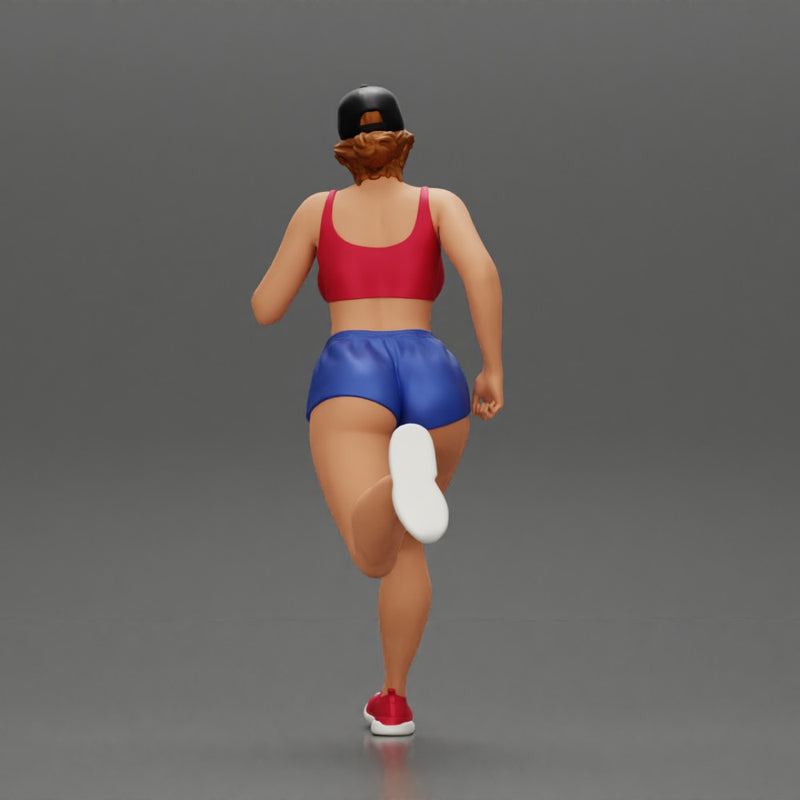 young woman running in shorts and cap