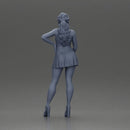 Confident Woman in Blue Dress Posing with Graceful Elegance - Only-Games