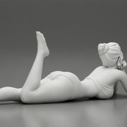 Sexy woman lying in fashionable elegant bikini swimsuit - Only-Games