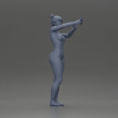 Naked woman taking a selfie with her phone on the beach - Only-Games