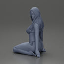 Beautiful Woman in Bikini Sitting on the Beach - Only-Games