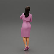 woman in bathrobe standing - Only-Games