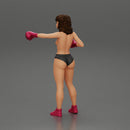 black naked breasts woman in boxing gloves with curly hair ready to finish off her opponent - Only-Games