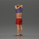 muscular man in shorts taking off his shirt to go swimming - Only-Games