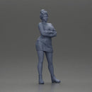 Woman in Orange Dress and Boots Stands Stylishly Confidence With Arms Crossed - Only-Games