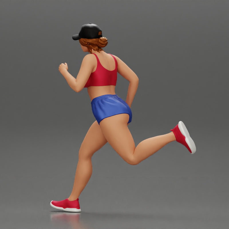 young woman running in shorts and cap