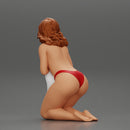 Sexy girl in bikini sitting and covering her body by towel - Only-Games