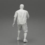 Man bent over while walking in cap - Only-Games