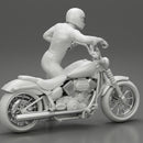 Motorbiker standing pushing his motorbike - Only-Games