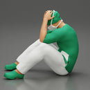 Thoughtful Surgeon Sitting  With His Hand On Head - Only-Games