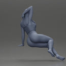 Fit girl in leggings sitting on a sofa - Only-Games