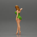 Sexy girl in onepiece standing with her friend on the beach - Only-Games