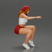 girl sitting in shorts and a scarf hair wants to grab something - Only-Games
