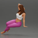 Fit girl in leggings sitting on a sofa - Only-Games