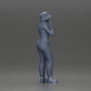 beautiful girl in pants and a hat thinking - Only-Games