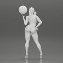 Sexy Young Sporty Girl Playing With the Ball on the Basketball - Only-Games