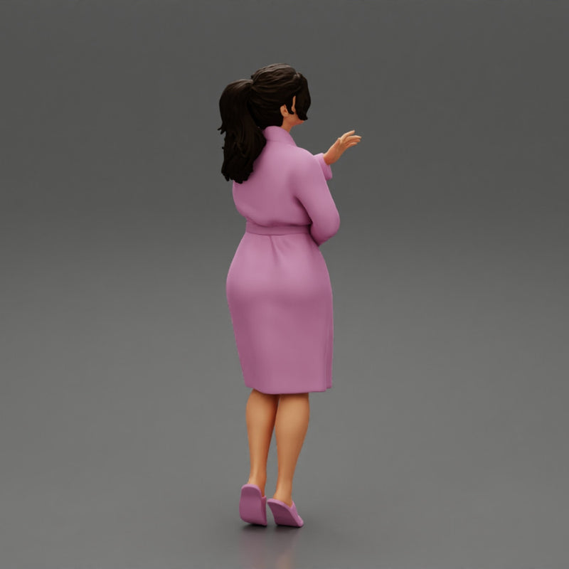 woman in bathrobe standing - Only-Games