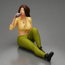 Tired woman mechanic in sexy shirt pants sitting and drinking water during from bottle - Only-Games