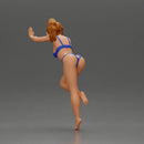 Woman in a bikini leaning on the car with her hands on the beach - Only-Games