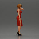 beautiful girl in a mini dress and heels with short hair places her hand on her neck - Only-Games