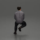 man sitting on a car, wearing a jacket and sunglasses, deep in thought - Only-Games