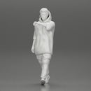 Man in a long hoodie  walking and looking at his watch - Only-Games