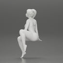 sexy girl in a bikini posing on the beach sitting at the deck chair - Only-Games