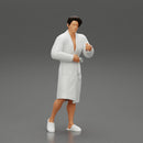 man in bathrobe standing - Only-Games
