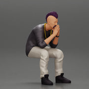 metal man sitting and contemplating with a satanic haircut - Only-Games