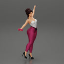 Happy Young Woman in pants Standing on One Leg holding phone - Only-Games