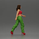 Woman Confidently Walks Forward in Stylish Green and Red Outfit - Only-Games