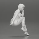 young woman sitting taking off her bib overalls - Only-Games