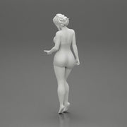 Sexy Girl standing in mini dress on the beach - Only-Games