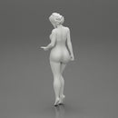 Sexy Girl standing in mini dress on the beach - Only-Games